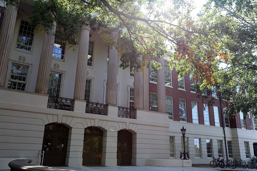 Historic Baldwin Hall stands in the late summer shade
